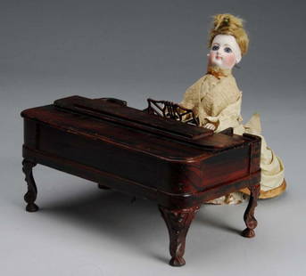 Girl Playing Piano Automaton.: Description Secore mechanical piano player. Working. Doll has a china head and metal hands. Piano has a clockwork mechanism. Condition (Excellent). Size 11" W.