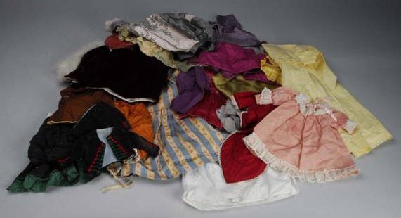 Large Lot of Doll Clothing.: Description Mixed new, antique and vintage. At least 100 pieces including dresses, skirts, coats, hats, underwear, etc. Mixed condition.