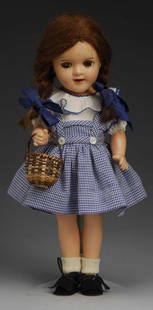 Ideal Composition Judy Garland.: Description American, 1939. All composition portrait doll of the child movie star as Dorothy from The Wizard of Oz, marked Ideal Doll on head and 16 on body. Brown sleeping eyes (one crackled),