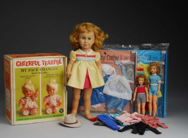 Lot of 6: Collectible Dolls.: Description American, 1960 to 1980. Chatty Cathy with original dress (does not chat, no undies or shoes); F & B John Wayne Legend Series, all original with tag; Ideal Tammy, Boxed with 10 pieces of ad