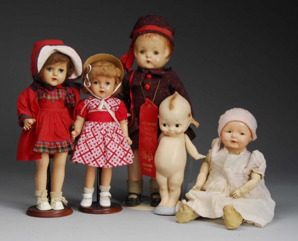 Lot of 5: Vintage Composition Dolls.: Description American 1913 to 1940. 19" T. Kewpie doll with 1913 Rose O'Neill sticker on base (light crazing, wear on fingers); Ideal baby with cloth body (face peeling, arms worn); unmarked girl with