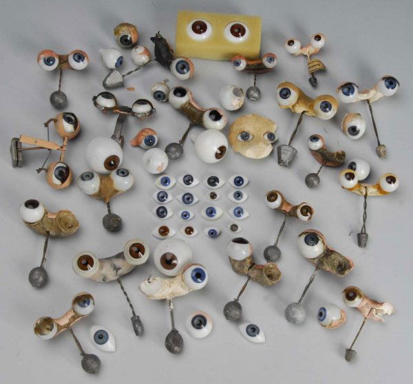 Large Lot of Vintage and Antique Doll Eyes.: Description Various sizes, some complete rocker sets, some singles; 14 paperweight eyes also, some matches. Not all pictured.