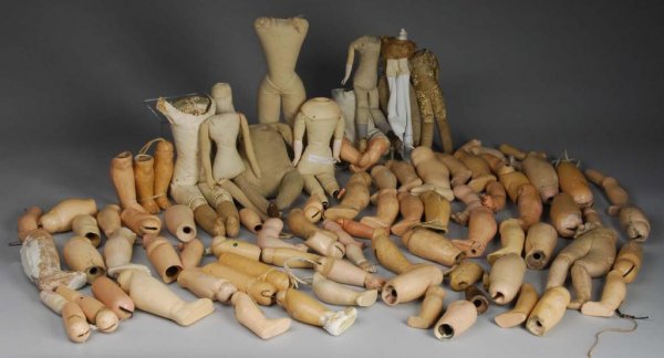 Large Lot of Antique Doll Parts and Bodies.: Description 150+ arms, legs, upper arms, thighs, some hands, Germany and French parts, some matches, some singles. Along with 12 bodies, including three antique leather bodies for fashions (no arms), 