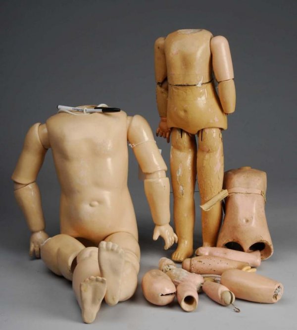Lot of 3: Antique Doll Bodies.: Description 24" chunky German child body (repainted, replaced thigh), 19" French walker body (bad repaint), 18" Jumeau body with jointed wrists (mixed parts). Condition (Poor - Good).