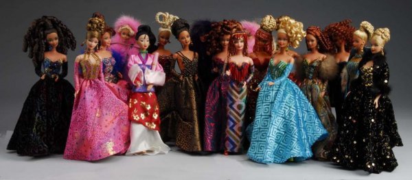 Large Lot of 23: Fashion Dolls.: Description Seventeen fashions with fancy hairdos and metallic gowns, most with Bruce A. Nygren Ltd. Labels, four Barbies with dyed Mink coats and hats, one red-haired doll in beaded gown. Condition (