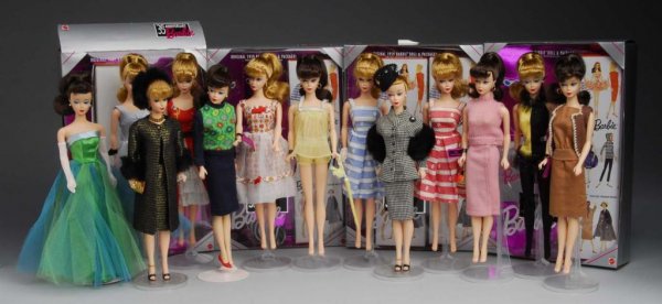 Large Lot of 20: Barbies.: Description Seventeen 35th Anniversary Barbies dressed in tagged Barbie clothes, two Barbies tagged CMO originals, one vintage Barbie with bendable knees and turning waist in a tagged Barbie bridal ou