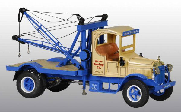 Pressed Steel Acme Tow Truck Toy.: Description Contemporary. Retro Toys of Chicago. New old stock. Includes original shipping box. Size 26" L.
