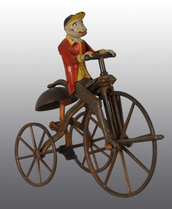 Arcade Monkey Tricycle Toy.: Description Restored. Replaced bell ringer. Condition (Very Good). Size 8 - 1/2" x 8".