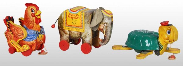 Lot of 3: Fisher Price Animal Toys.: Description American. Circa 1950s. Includes one Timmy Turtle, one Cackling Hen, and one Musical Elephant with original ears. Condition (Very Good). Size All: 10" L.
