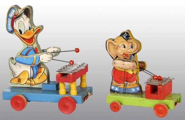 Lot of 2: Fisher Price Animal Xylophone Toys.: Description American. Includes one no. 780 Jumbo the Elephant and one no. 177 Walt Disney Donald Duck. Condition (Very Good). Size Largest: 9" L.