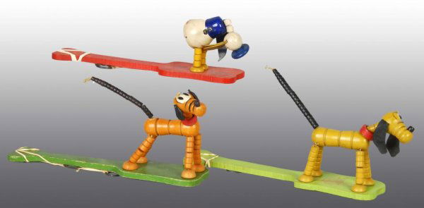 Lot of 3: Fisher Price Pop-Up Paddle Toys.: Description American. Includes one Disney Donald Duck and two Pluto toys. Donald has scarce original wings. Condition (Very Good). Size All: 14" L.