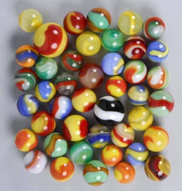 Lot of 43: Machine-Made Marbles.: Description Includes mostly Akro Agates and a couple Popeyes. Condition (Near Mint Plus). Size Largest: 13/16" Dia.