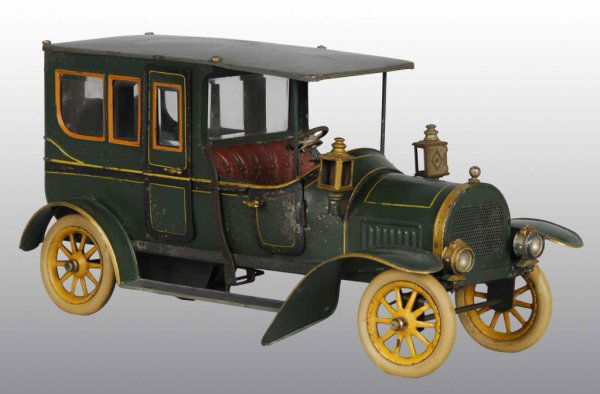 Tin Hand-Painted Bing Limousine Toy.: Description German. Clockwork mechanism is working. Includes four original lamps and beveled glass. Rubber tires have been replaced and fenders have been redone. Some paint flaking and loss throughout