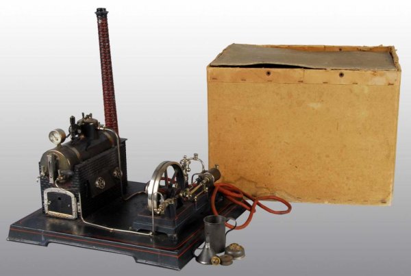 Doll No. 364 Horizontal Steam Engine in Box.: Description This engine was shown in the Doll catalog no. 37. The boiler includes a water glass, water gauge, whistle, and a weighted safety valve with a simulated brick chimney. The engine includes a
