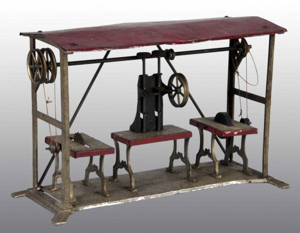 Tin Hand-Painted Weeden Workshop Toy.: Description American. Includes drill press, saw, and grinder. Marked "Weeden" on base. Some denting to roof and some paint loss to base and roof. Condition (Very Good). Size 10 - 1/2" L.