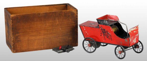 Tin Weeden Live Steam Car Toy.: Description American. One of the first tin autos made. Original seat and back piece with nice stenciling of an American Flag on both sides of car. Some moderate paint flaking and loss throughout front