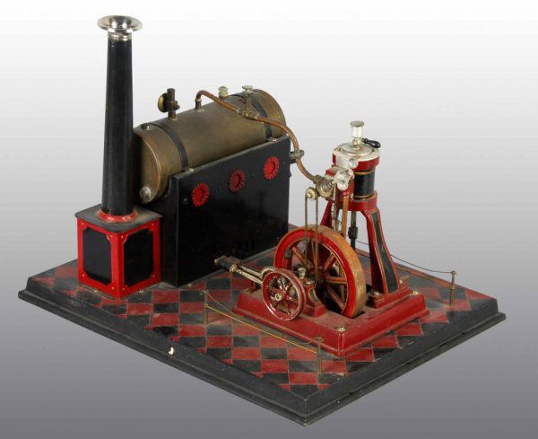 German Marine Steam Engine Toy.: Description Engine with horizontal boiler. Probably made by Falk or Schoenner. Note the unique working mechanism of the marine engine. Colorful in its red checkered base, red engine and red trim. A ve