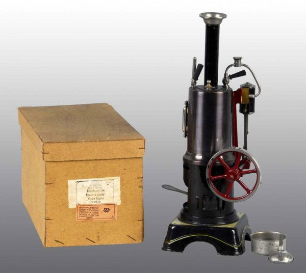 Bing No. 10/12/2 Vertical Steam Engine Toy.: Description Includes original cardboard box. The engine comes with a funnel and filler pan. The engine and box are in near new condition. Condition (Near Mint). Size 12 - 1/2" T.