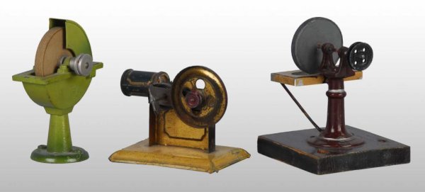Lot of 3: Workshop Steam Toys.: Description Includes a Mohr & Krauss tin wind-up horizontal steam engine along with a Marklin Grinding Wheel and a Plank Grinding Wheel. Condition (Very Good). Size 3" x 3 - 1/2". Base: 3 - 1/2".