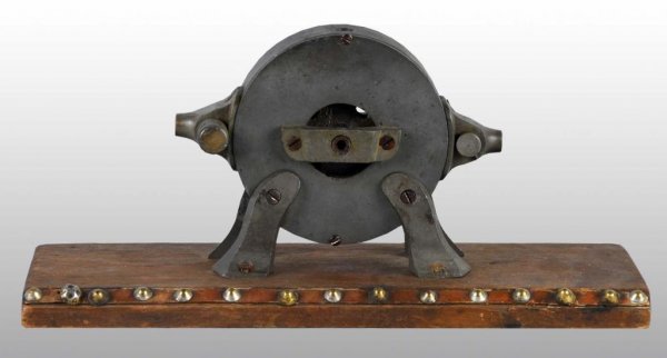 Patent Model of a Rotary Steam Engine.: Description Patented February 4, 1871 by Joe Mossholder. Condition (Very Good). Size 5 - 1/2" x 6 - 1/2". Base: 12".
