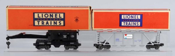 Lot of 2: Lionel O-Gauge Freight Cars.: Description American. Post-war. Includes no. 6460 crane car and no. 6346 Alcoa hopper car. Both cars show minimal play wear and are in excellent plus to near mint condition. Includes both original box