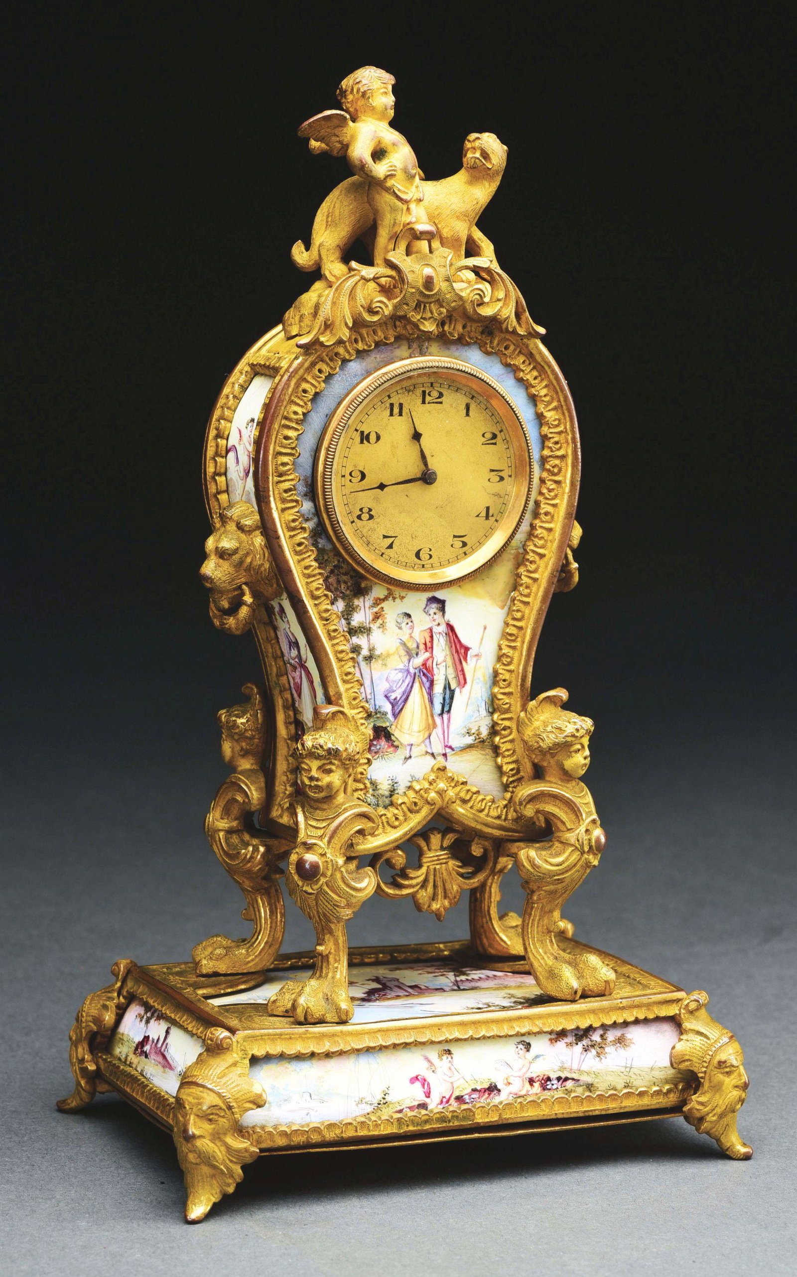 ORMOLU MOUNTED TABLE CLOCK.: Hand painted enameled metal panels on sides and front. Gilt metal dial. Chipping to enamel, movement probably replaced. Probably Austrian or French, circa 1880's. Condition: (Fair). Dimensions: 6 - 3/