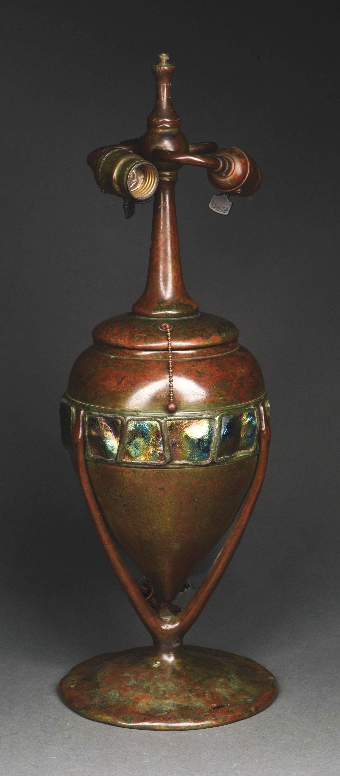 TURTLEBACK TILE TABLE LAMP BASE.: A rare Tiffany Studios patinated cast bronze and glass “Turtleback Tile” table lamp base, decorated with a belt of highly iridescent turtleback tiles leaded within the base creating a belt, and re