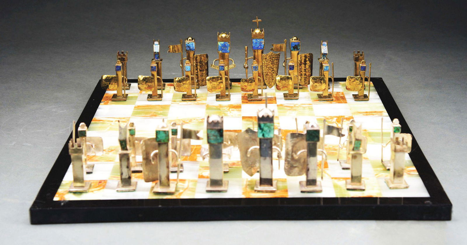 VINTAGE TAXCO CHESS SET.: Taxco vintage chess set, complete on marble board. Pawns 2 - 1/2" tall, king 4 - 1/2" tall. No damage or repairs. Condition: (Excellent). Dimensions: 18" x 18" x 3/4".