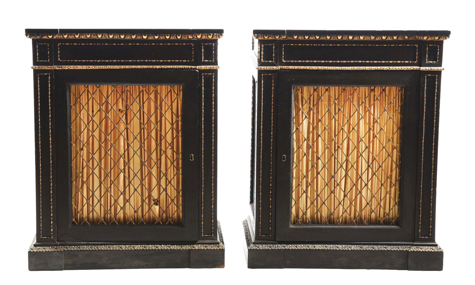 PAIR OF FRENCH EBONIZED SIDE CABINETS.: Circa 1880's. Brass wire grilled doors, ormolu mounted pair of cabinets. Fabric behind grill in poor condition. Interior doors are added. This is not a standard shippable item and will require 3rd par