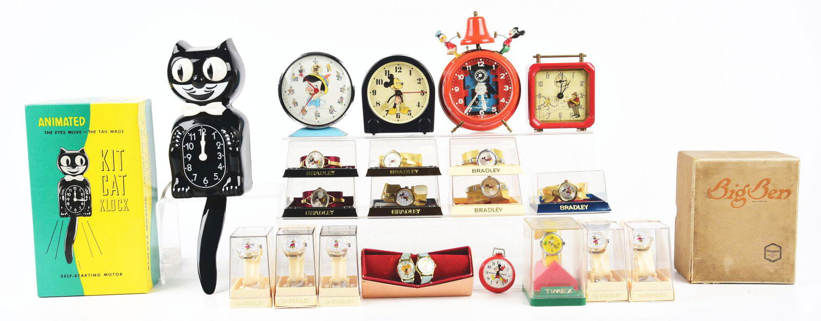 LARGE LOT OF APPROXIMATELY 20 MOSTLY DISNEY CHARACTER: Large lot of approximately 20 mostly Disney character watches and clocks, many in original boxes. There is 14 different Bradley watches, mostly Mickey Mouse, a couple are Barbie, there is a Kit Kat cl