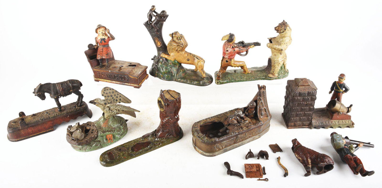 LOT OF 8: CAST-IRON PROJECT BANKS INCLUDING CHIEF (1 of 7)