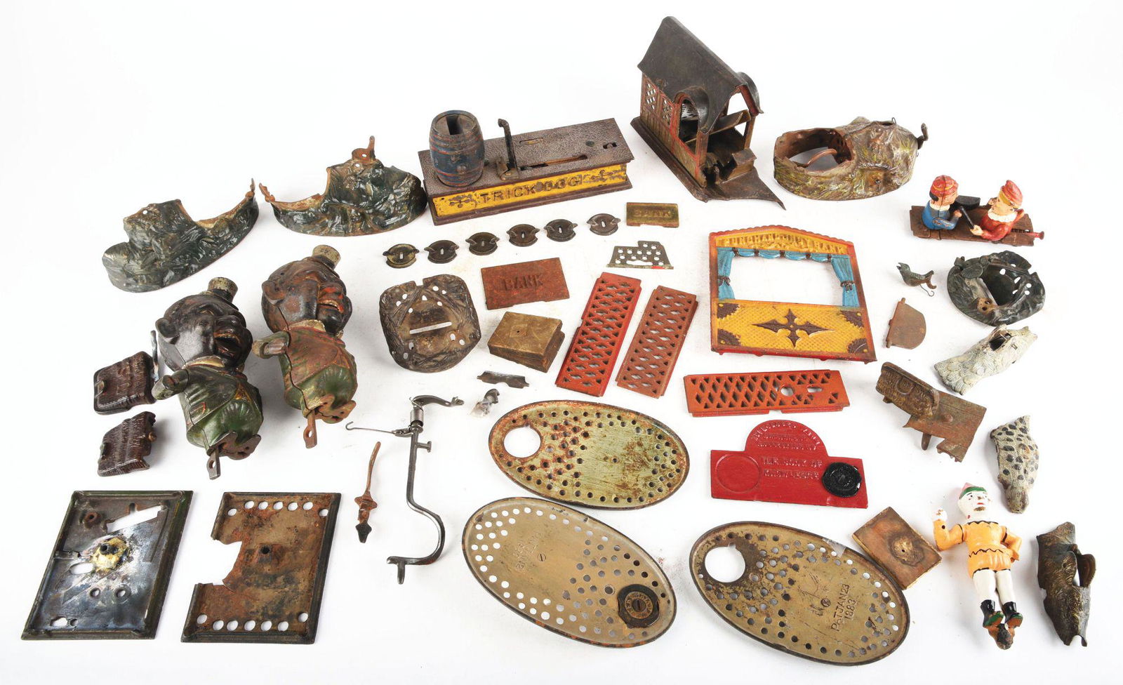 LARGE LOT OF MECHANICAL BANK PARTS. (1 of 8)