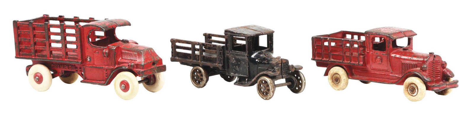 LOT OF 3: CAST IRON AMERICAN MADE STAKE BACK TRUCKS. (1 of 3)
