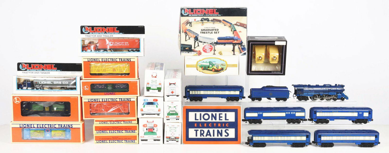 LARGE LOT OF LIONEL MODERN ERA TRAINS AND HESS TRUCKS. (1 of 2)