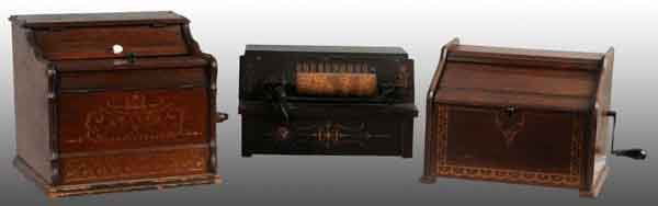 Lot of 3: Musical Organ Players.: Includes one Gem roller organ, one Cately, and one no. 2 Musical Casket. Largest: 14" W. (Very Good - Excellent).