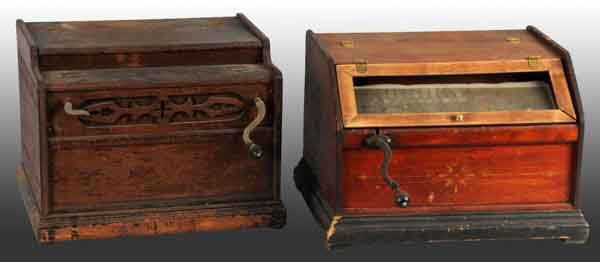 Lot of 2: Musical Organ Players.: Includes one musical Gashet that plays paper rolls and one concert roller organ. Largest: 18" W. (Very Good - Excellent).