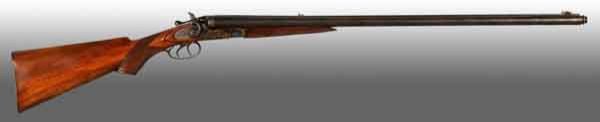 Belgian T. Barker Double Barrel Shotgun.: OL: 46 - 1/2". BL: 30". 12 GA. S: European walnut with a straight pistol grip. Stock has been refinished. Left barrel has a .38 CA. Double trigger with a pull of 14 - 1/2".Side lock with top lever rel