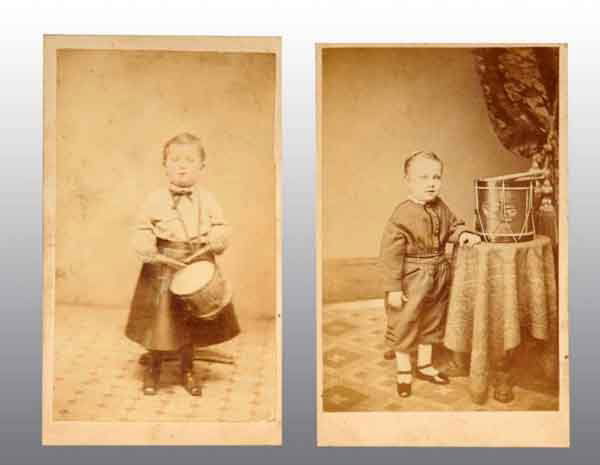 Lot of 2: Drummer Boy CDVs.: Full standing views with drums. Back marked "E.M. Ayers, Jersey City, NJ" on one and "G.D. Wise, Philadelphia, Pa" on the other. 4" T. (Excellent).