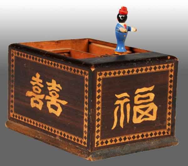 Wooden Roll Up Cigar Case with Chinese Characters: American. 1920s. Works well. Open top and Chinese character pops up with cigarette. 5" x 3" x 3 - 1/2". (Excellent).