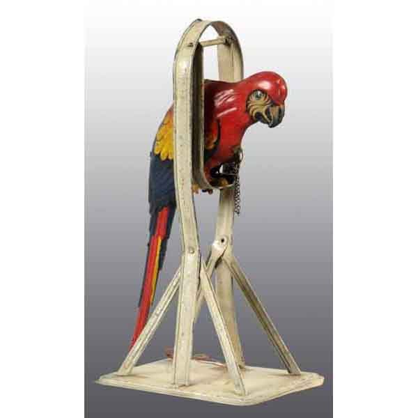 Tin Parrot on Swing Wind-Up Toy.: German. Needs adjustment to work properly. When wound, parrot swings on perch. Base is handpainted and parrot is lithographed. Some paint wear to base. 10" T. (Very Good - Excellent).