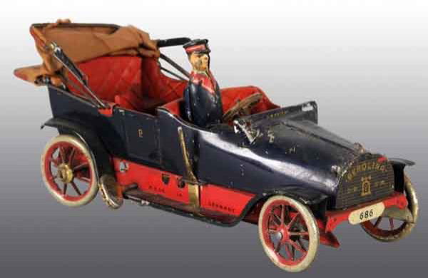 Tin Lehmann Berolina Car Wind-Up Toy.: German. Working. Original tin driver, marked "DRGM" on hood, and "Berolina" on front with Lehmann symbol. Original canvas roof with some tattering and staining. Some scratching and paint loss to left