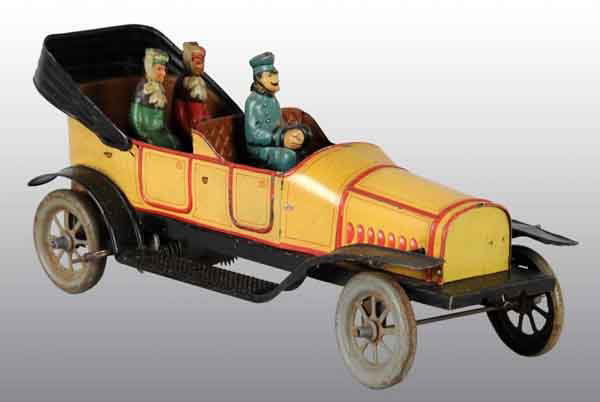 Tin Fisher Automobile Wind-Up Toy.: German. Working. Includes tin litho original driver and two female passengers. Car is all original with metal plate on bottom marked "Made in Germany". Some pitting to metal wheels but very minor wear