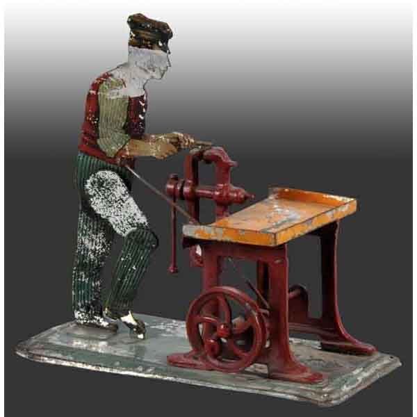 Bing Locksmith No. 9956/99.: Circa 1902. Heavy lithograph loss to the workman. Scarce. 5" x 4". Base: 5 - 1/2". (Good - Very Good).