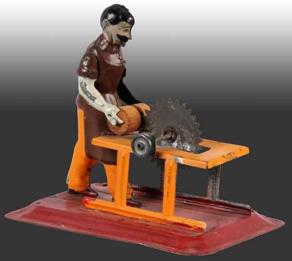 Arnold Sawyer at Circle Saw No. S23.: Circa 1920. This is the variation of this toy showing the workman sawing a log. 4" x 4". Base: 5". (Very Good).