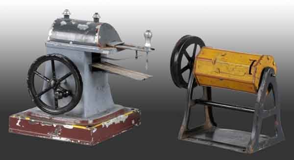 Lot of 2: Steam Toy Accessories.: A spot welder or forming machine together with a churn. Some paint loss. Largest: 3 - 3/4" x 4". (Very Good).