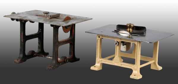 Lot of 2: Circle Table Saw Steam Toy Accessories.: Cast bases. Largest: 2 - 3/4" x 4 - 1/4". (Very Good).