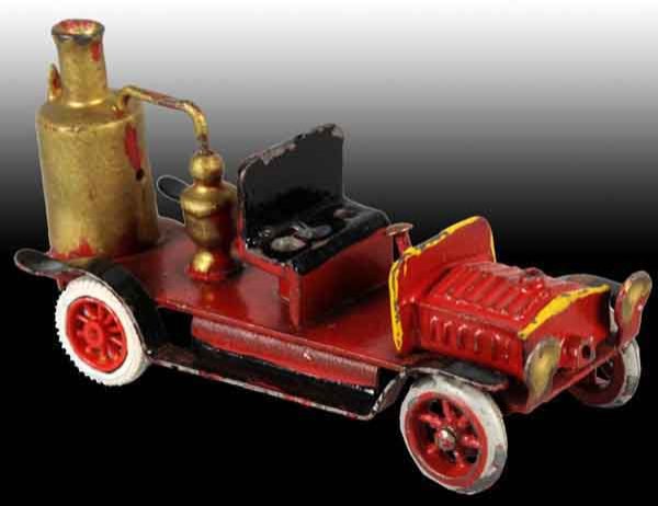 Small Cast Steam Fire Truck.: Believed to have been made by Bing. 1 - 1/2" x 2 - 3/4". (Very Good).