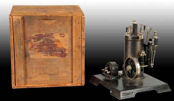 Marklin No. 4112 With An Original Dynamo.: This engine includes the pressure gauge, whistle, and weighted safety lever, cylinder oiler and a flyball governor. It has a Marklin name plate on the base in original box. 9" x 9". Base: 10". (Very G