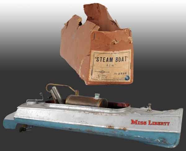 "Miss Liberty" No. 2520 Steam Boat Toy.: Maufactured by C-K of Japan. In its original box. The box is in poor condition but has a very good decal on its end naming the boat and its manufacturer. Made for the American market. 14" L. (Very Goo