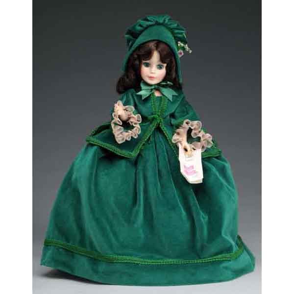 Madame Alexander Scarlet O'Hara.: Vinyl doll circa 1970s. Swivel neck, jointed at elbows and hips, sleep eyes, original tag hanging from left hand, and high-heeled slippers. 20" T. (Excellent).